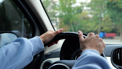 Driver Hands on Steering Wheel Making Left Turn Roanoke